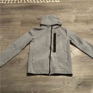 Nike tech. Size adult small.